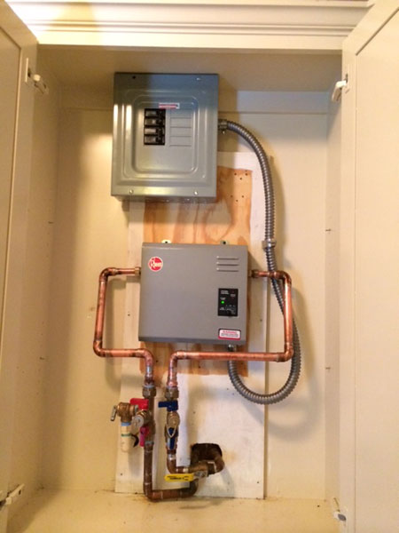 tankless water heaters installed in a cabinet