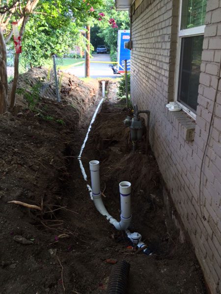 image of a pipe laying in a trench