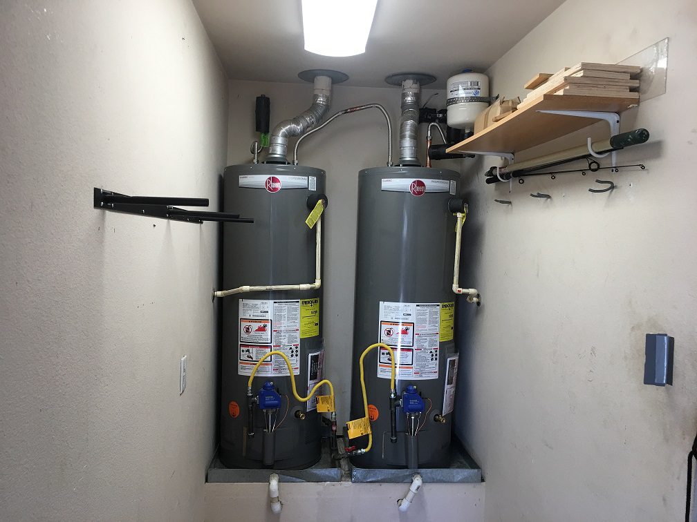 two hot water heaters beside each other